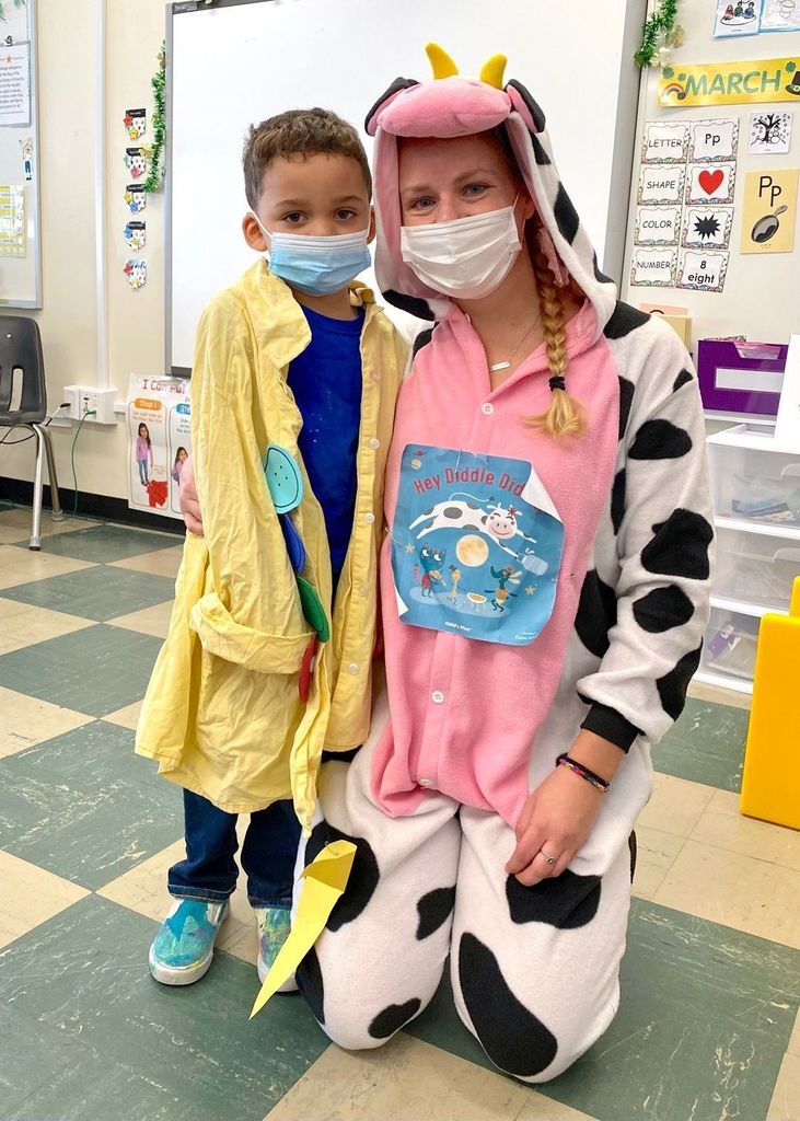 Jones teacher Melanie Gordon dressed up as the cow that jumped over the Moon from the nursery rhyme "Hey Diddle Diddle" and one of her students dressed up as Pete the Cat from Pete the Cat and His Four Groovy Buttons!